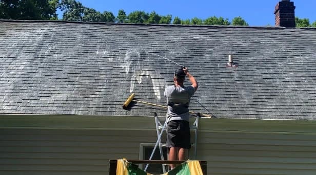 Before and after results of roof washing by Elyria Power Washing in Elyria