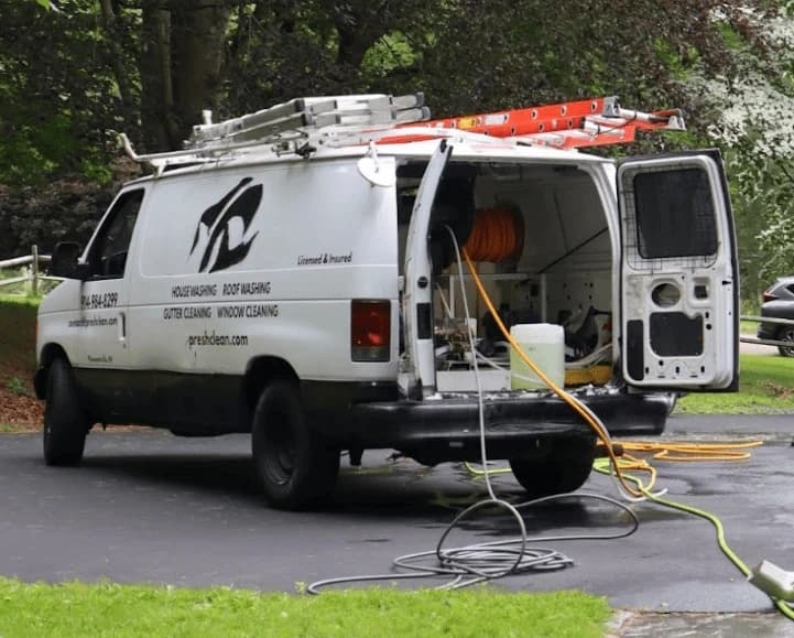 Elyria Power Washing professionals cleaning commercial fleet in Elyria